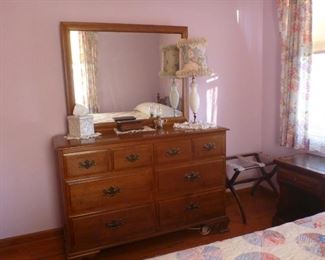 Vintage pecan mirrored dresser in excellent condition.