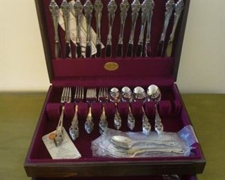Oneida Community Stainless Set of 12 complete and with extra pieces.  Like new!