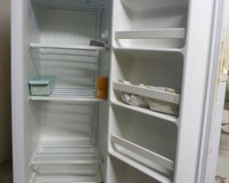 Upright small freezer.  Very clean.
