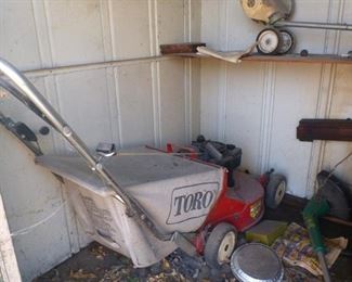 Toro Lawn Mower.  I assume this baby works but have yet to get gas and test it.  