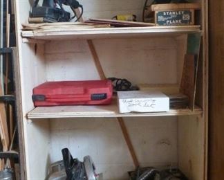 There is a Sears Craftsman Bench Grinder, Scroller Saw, Vice, Montgomery Ward Power Draft Drill and Heavy Duty Circular Saw,   Black and Decker Sander and more.  There are several Stanley tools also.