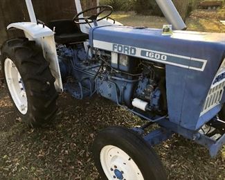 #0)  $3000 - 1970’s Ford 1600  Diesel Farm Tractor.  Model A1012T Serial #U111288.  3223 Hours .  2WD, 23 HP, 540 Rear PTO 3Pt Hitch, Sold with a 60 inch blade with Hydrolic Lift.  Sold with a plow attachment.  Six forward gears, 2 reverse gears, Rear auxiliary hydraulic.  Runs well.  