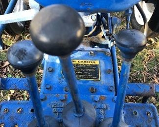 #0)  $3000 - Ford 1600  Diesel Farm Tractor.  Model A1012T Serial #U111288.  2WD, 23 HP, 540 Rear PTO 3Pt Hitch, Sold with a 60 inch blade with Hydrolic Lift.  Sold with a plow attachment.  Six forward gears, 2 reverse gears, Rear auxiliary hydraulic.  Runs well.