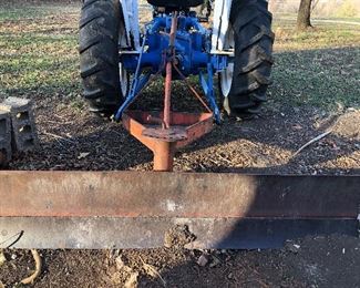 #0)  $3000 - Ford 1600  Diesel Farm Tractor.  Model A1012T Serial #U111288.  2WD, 23 HP, 540 Rear PTO 3Pt Hitch, Sold with a 60 inch blade with Hydrolic Lift.  Sold with a plow attachment.  Six forward gears, 2 reverse gears, Rear auxiliary hydraulic.  Runs well.