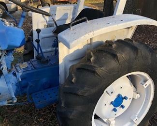 #0)  $3000 - Ford 1600  Diesel Farm Tractor.  Model A1012T Serial #U111288.  2WD, 23 HP, 540 Rear PTO 3Pt Hitch, Sold with a 60 inch blade with Hydrolic Lift.  Sold with a plow attachment.  Six forward gears, 2 reverse gears, Rear auxiliary hydraulic.  Runs well.