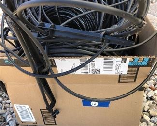 #13) $15 - Rolled drip-irrigation system tubing, several hundred feet, various sizes