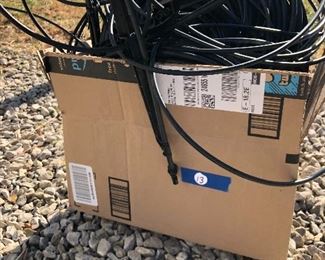 #13) $15 - Rolled drip-irrigation system tubing, several hundred feet, various sizes