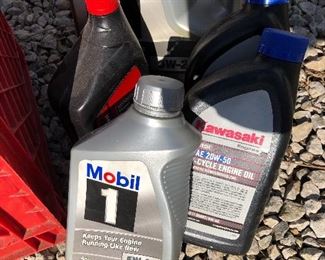 #15) $75 - 17 assorted containers of Mobil 1 Synthetic Motor Oil, 5W-30, 5W-20, and 4-cycle engine oil