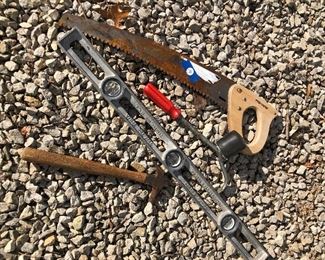 #19) $20 - Lot of miscellaneous tools, 24-inch fiskar saw, 3-foot level, hammer, and tire tool