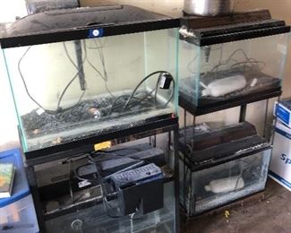 #35) $150 All - Aquarium equipment including four aquariums, two 8-gallon and two 20-gallon aquariums with stands, books, and assorted equipment