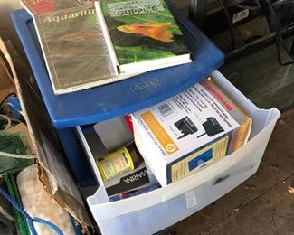 #35) $150 All - Aquarium equipment including four aquariums, two 8-gallon and two 20-gallon aquariums with stands, books, and assorted equipment