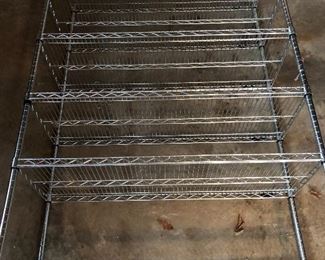 #50) $60 - Stainless Steel Food Service Rack on Coasters.  60 inches wide 18 inches deep 72 inches tall.