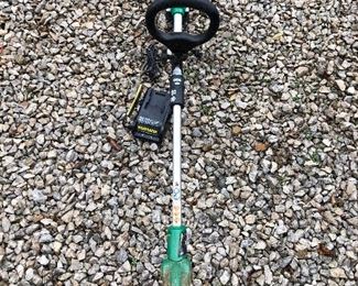 #7) $20 - Weed Eater Brand Battery Powered Yard Trimmer  with Lithium Battery Charger.