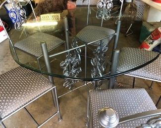 #60) $325 - Iron Table with Glass Top and 5 Iron/Fabric Chairs.  48 inch table.  