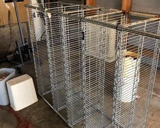 #61) $20 - Stainless Steel Food Service Shelf.  No Casters.  48 inches wide by 15 inches deep.  A little rust or corrosion on one leg and shelf.  