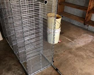 #61) $20 - Stainless Steel Food Service Shelf.  No Casters.  48 inches wide by 15 inches deep.  A little rust or corrosion on one leg and shelf.  