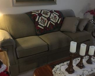 . . . a beautiful olive-colored couch