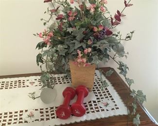 . . . . hand weights and faux flowers