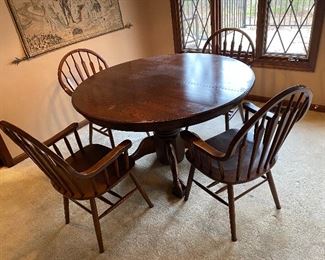 1. Older Oak Table and chairs $175