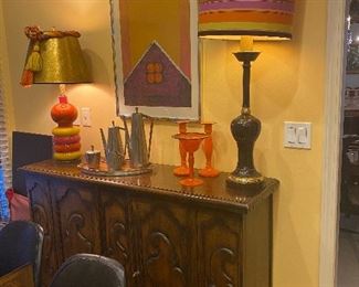 Carved wood buffet 300
Mid Century Orange & yellow lamp 200 sold
Metal lamp with custom shade 155
Vincent Rojo lithograph “abstract” c1969  700
Pewter tea set sold
Or best offer Call 248 672 6663