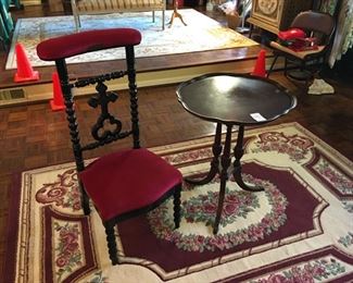 Prayer chair, scalloped table, area rug