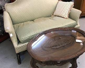 Look at this great chippendale love seat.  Also carved walnut table with glass top table.