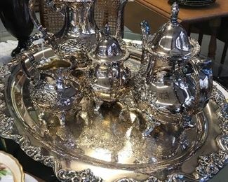 This baroque silver coffee and tea set on an amazing tray.