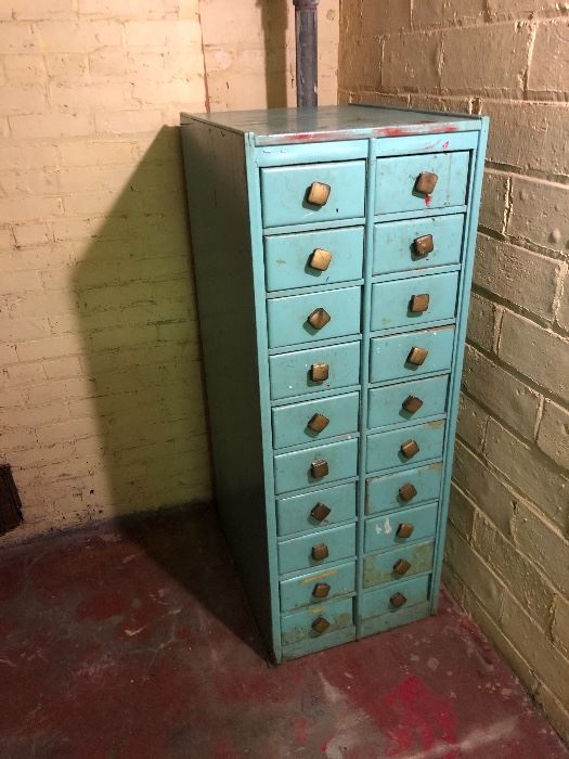 Measures approximately 19 3/4” across by 25 1/4” deep by 53” tall.  Drawers can be turned around to show a wood face.