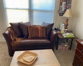 Leather loveseat/ sleeper