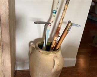 Terra cotta floor vase, walking sticks