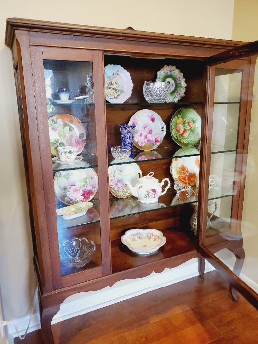 Stunning lighted antique vitrine, display, curio cabinet. It has had electricity added and is now lighted. The original wooden shelves have been replaced with grooved glass shelves for plate display. 
$800 (contents sold separately - Victorian hand painted plates and teapot range $10 - $30)