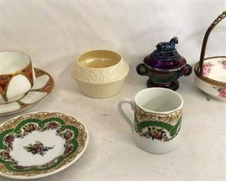 https://connect.invaluable.com/randr/auction-lot/rosenthal-cup-saucer-imperial-carnival-glass-hen_58A46CB8E9