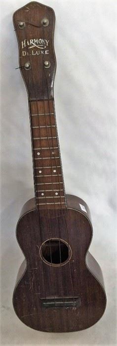 https://connect.invaluable.com/randr/auction-lot/vtg-harmony-delux-ukulele_8C84E13825