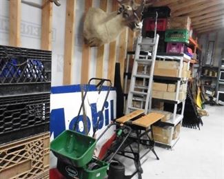 103" mobil metal sign.  100 Milk crates.  Work table.  Reindeer caraboo.  Aluminum ladder Cd's