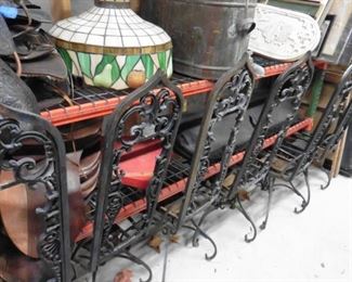 Gothic wrought iron chairs  tiffany like lamp shade glass,  copper still 