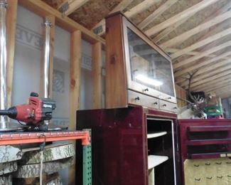 Weed wacker gun display case.  Fireproof gun safe