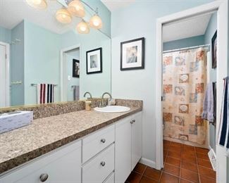 Bath vanity with faux granite Formica top