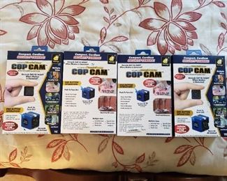 4 cop cams, new in box
