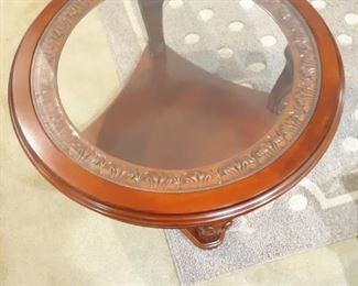 Round wood and glass coffee table
