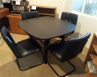 Table and four chairs