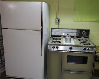 older fridge and gas stove