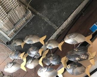 metal sculpture fish school