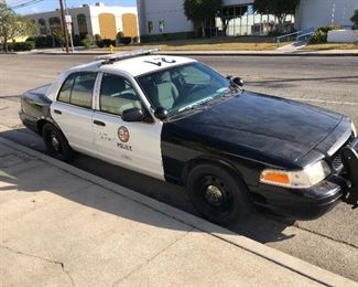 ORIGINALLY AN LAPD POLICE CRUISER WITH BALLISTIC DOORS. USED IN MOVIES NOW, LOW MILEAGE - RUNS GREAT!