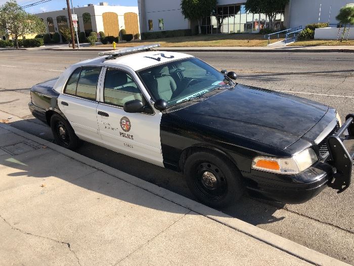 ORIGINALLY AN LAPD POLICE CRUISER WITH BALLISTIC DOORS. USED IN MOVIES NOW, LOW MILEAGE - RUNS GREAT!