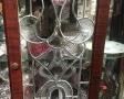 Curio with leaded glass door.