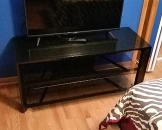 TV stand with 2 glass shelves 