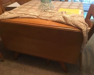 Heywood Wakefield Dining Table showing Gate-Leg Drop Leaf--This Large (Two-Leaf) Formal Table --Folds to Intimate Two-Top  (or Space-saving Gem)  