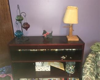 Bookshelf. Books, Candle Holder, Lamps, etc.,.
