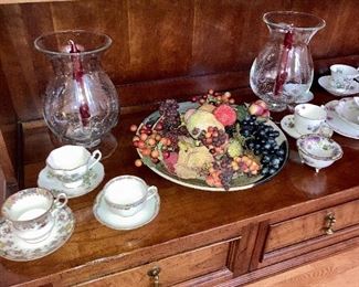 Large hurricane style glass candlestick holder, a variety of English tea cups including Queens, Queen Anne, Royal crown pottery, royal Albert, Copelands Spode, and Limoges France