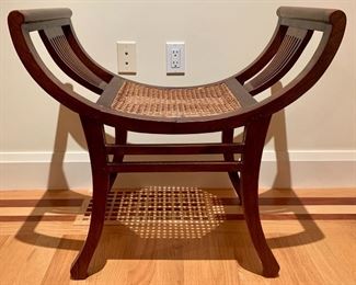 Item 53:  (2)  Wooden Kartini stool features an elegant scoop design, with caned insert. - 29.25"l x 16"w x 27.5"h: $100 each